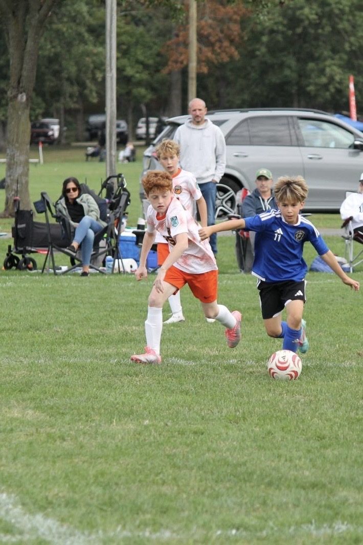 EKS U11 player on the ball at the EDP Cup